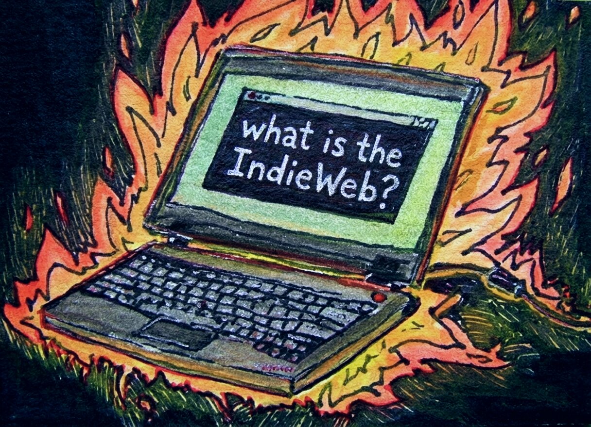 Artistic illustration in a sketchy style showing a laptop computer engulfed in vibrant orange and yellow flames against a dark green background. The laptop's screen displays the text 'what is the IndieWeb?' in white handwritten letters.