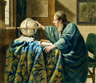 A 17th-century painting of a man with long wavy blond hair, wearing a flowing blue-green robe, standing at a table and reaching up to touch a celestial globe. The table is draped in a richly patterned blue, green, and gold cloth. An open book and other instruments rest nearby. Behind him hangs a framed painting, and on the wall above the globe is a diagram inscribed 'Meer. MDCLXXIII.' Soft light enters from a leaded window at left.