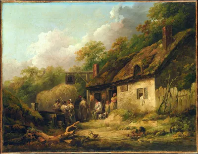 Oil painting of a rustic countryside inn scene. A thatched-roof whitewashed cottage with two brick chimneys serves as a wayside inn, identified by a hanging bell sign on a wooden post. Several figures in 18th-century rural clothing gather outside — some standing and conversing near a haycart, others seated by the inn's entrance with a dog. A wooded hillside rises behind the building under a partly cloudy sky. A small stream or puddle is visible in the foreground. The painter's signature appears in the lower right corner.