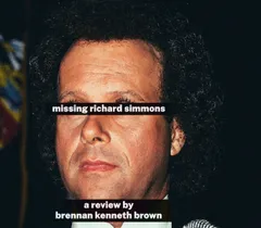 Extreme close-up crop of a colour photograph of Richard Simmons' face, showing his voluminous dark curly hair, forehead, nose, and mouth in warm, slightly grainy tones with a dark background. A colourful blurred flag is faintly visible in the upper left corner. Two black text bars overlay the image: one across the eyes reading 'missing richard simmons,' and one near the bottom reading 'a review by brennan kenneth brown,' both in bold white sans-serif type.